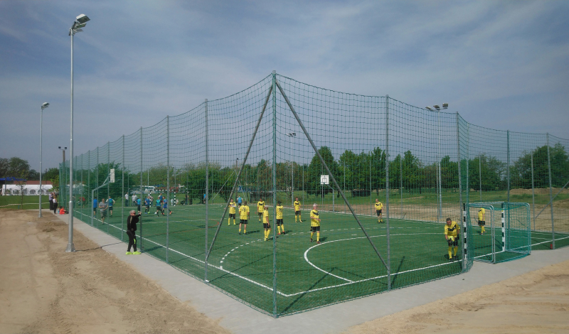 Artifical grass covered multifunctional sport court