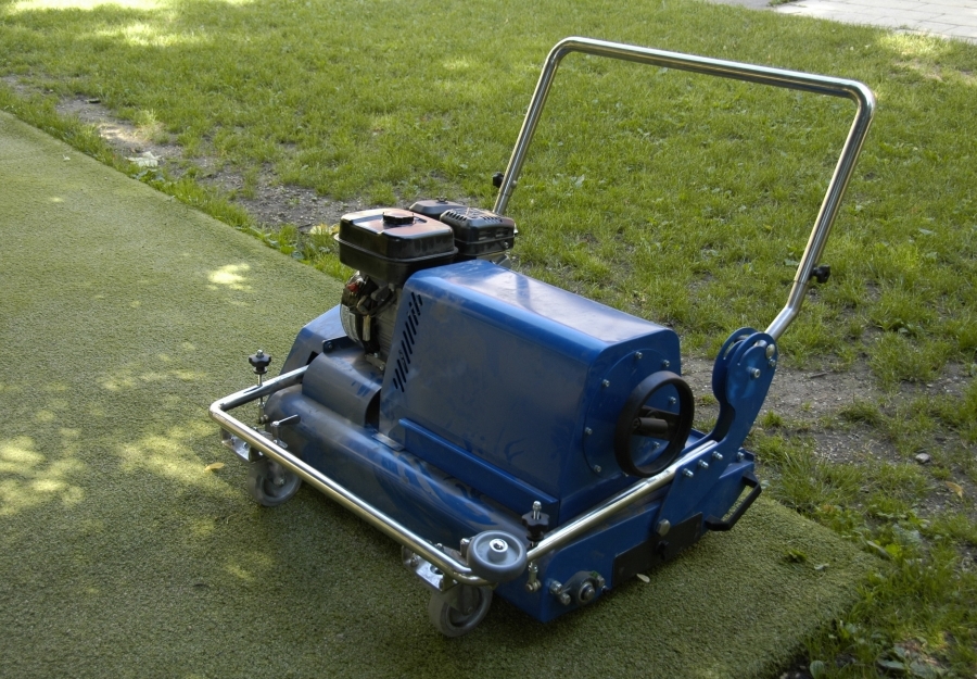 Artifical grass sportcourt maintenance - Artificial grass brush before use